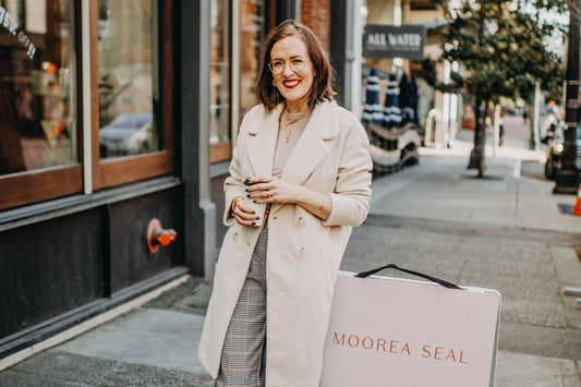 Moorea Seal in front of her downtown Seattle store